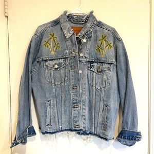 Levi’s Ripped Denim Jacket